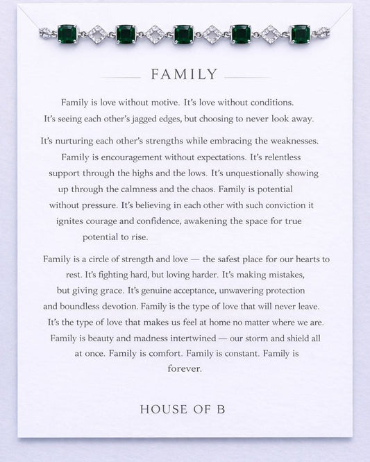 Text about family with a green gemstone bracelet on a white background